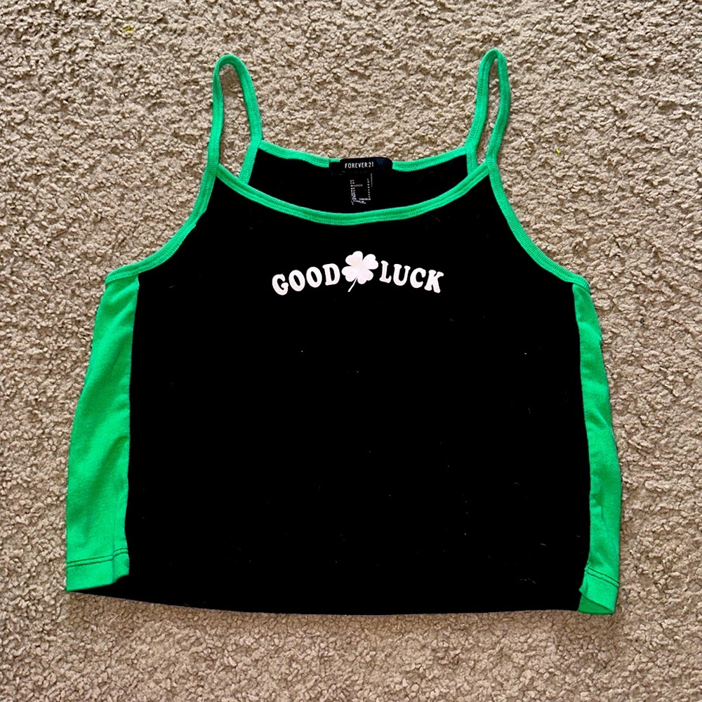 Cropped Irish Tank Top in Black and Green with a "Good Luck" Graphic Design.